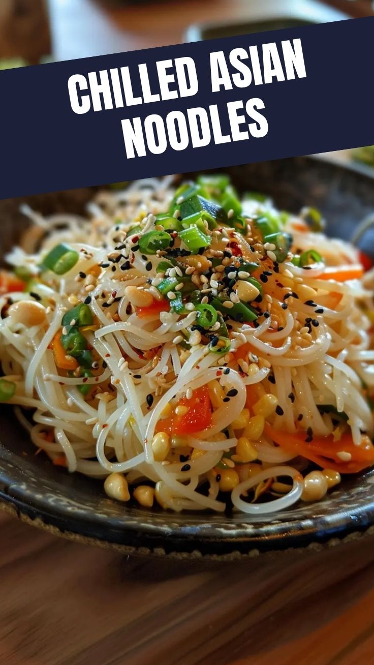 A refreshing bowl of Asian-style cold noodle salad with vegetables and dressing